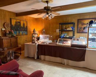 Looking across the living room and towards the register area, and jewelry