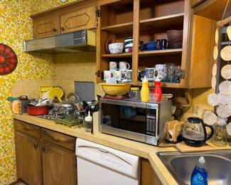 Lots of pots and pans, utensils, Panasonic Microwave, mugs, bowls, serving pieces