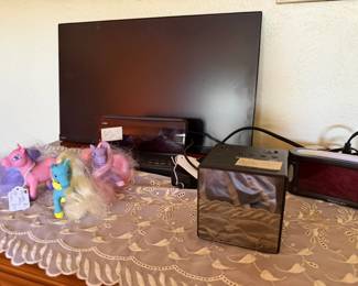 Flat screen monitor, alarm clocks and radios, My little pony