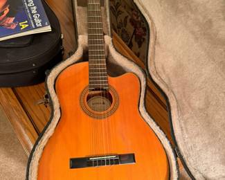 Guitar made by Samick, serial #9216000136, with case