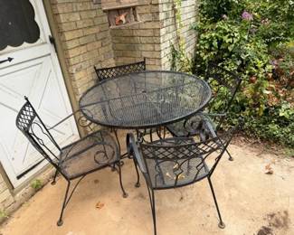 MCM Wrought Iron table and 4 chairs
