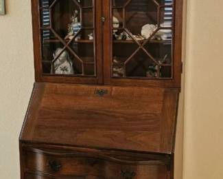 Antique Secretary $160 Dimensions-16 inches deep 30 1/2 inches wide 76 inches tall ( Items inside are not included)