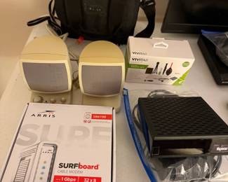Cameras, Roku, Cable Modem and Speakers