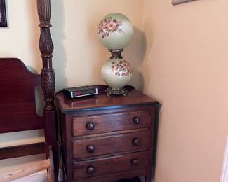 Antique bedside table and gone with the wind style banquet lamp