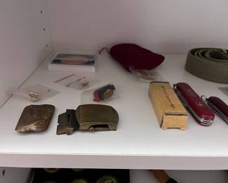 Pocket knives and belt buckle