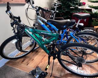 Two next  bikes and 2 fold up bicycles