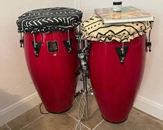 Very nice condition red congas with stand