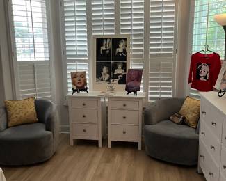 2 gray barrel chairs