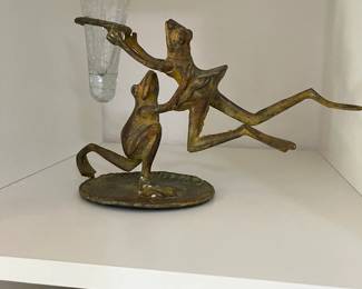 Lots of frogs.  bud vase?