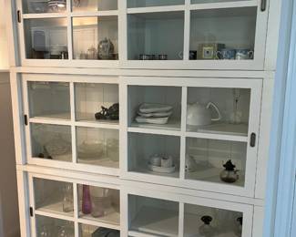 Large display case with sliding doors comes apart for easy moving