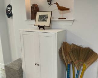 more cabinets and art
