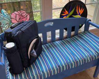 Stained glass and blue bench