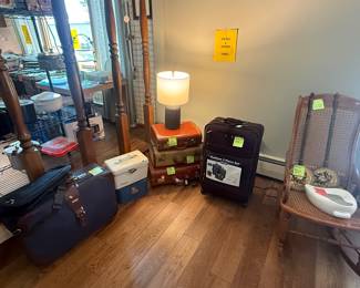 Vintage suitcases in excellent condition. Great decorative feature. Also brand new 3-piece suitcase set. Never used - tags still on!