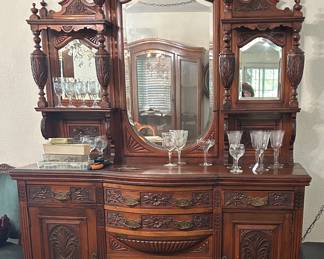 Side board. Multi mirror. Trinket shelves. Cup and cover motif.