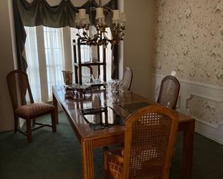 Large dining table with cane back chairs