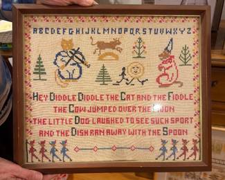 Framed cross stich needlework sampler