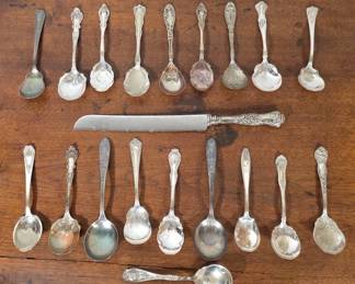 Silver Flatware with Ornate Patterns