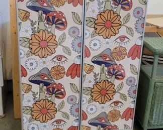 Wooden Cabinet With Floral Patterned Doors