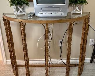 Vintage Hollywood Regency Style Console Table with Feather/Leaf Motif Metal Base and Glass Top