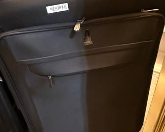 Black "Lightweight" Brand Rolling Suitcase with Telescoping Handle