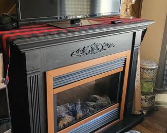 Electric fireplace.  Televisions 