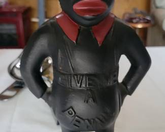 Black memorabilia "give me a penny" bank