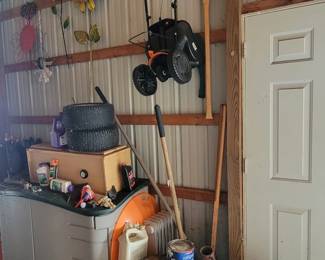 Yard tools.  Spreader.  Storage 