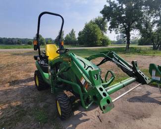 2019 John Deere 1025R.  With 120R front end loader and ballast bucket