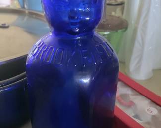 Brookfield cobalt milk bottle with baby face