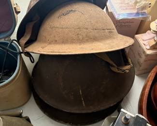 . . . military doughboy helmets