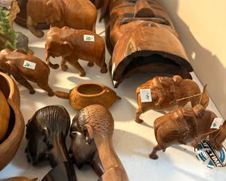 . . . wood-carved elephants, busts, mask