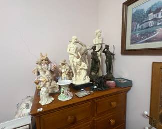 . . . sculptures -- alabaster and bronze
