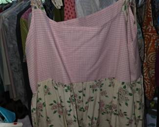 cottagecore-inspired cami dress features a pink gingham bodice paired with a tiered, floral print skirt.