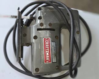    This is a vintage Craftsman sabre saw, likely a Model 315 series, featuring a distinctive metal housing and "double insulated" construction