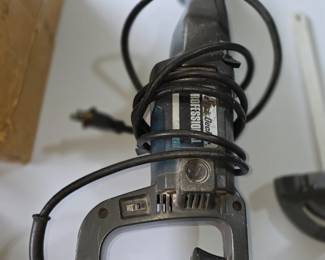 This appears to be a Black & Decker branded corded electric reciprocating saw.