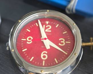 Pendulux Deep Sea Wall Clock, designed to resemble a Cold War-era Russian submarine timepiece.
