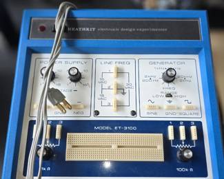    This is a vintage Heathkit Model ET-3100 Electronic Design Experimenter, commonly used for educational electronics projects.