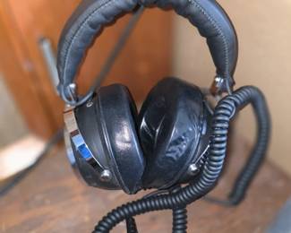 Soundesign Model 355 stereophonic headphones, commonly featuring a coiled cable and adjustable headband.