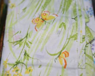 vintage Bibb Company bedding set, often referred to as the "Spring Meadow" pattern, featuring yellow and orange butterflies on a white background with green foliage.