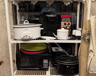 Large Selection of Kitchen items including Cookware Dishes and Flatware/Silverware.