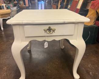 French Provincial side table with dressed white finish, single drawer with brass pull 