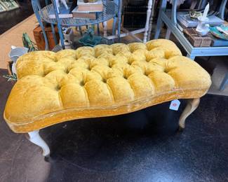 Vintage Velvet Chesterfield gold velvet ottoman with deep button tufting & carved legs 