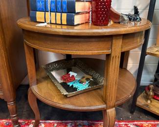Vintage style circular two-tiered side table with curved legs