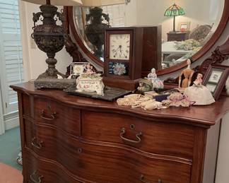 Antique serpentine front dresser