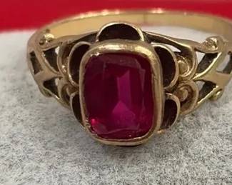 Gold Colored Ring With Garnet Like Stone