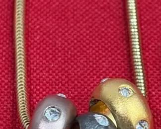 2 Gold Tone Necklaces