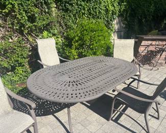 OUTDOOR TABLE AND 4 CHAIRS