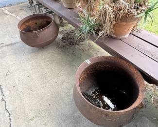 Very cool antique iron cauldrons