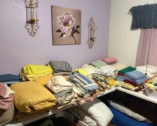 Linens, wall art and sconces