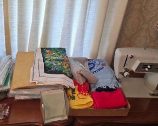 Master bedroom has three sewing machines. Two are portable.